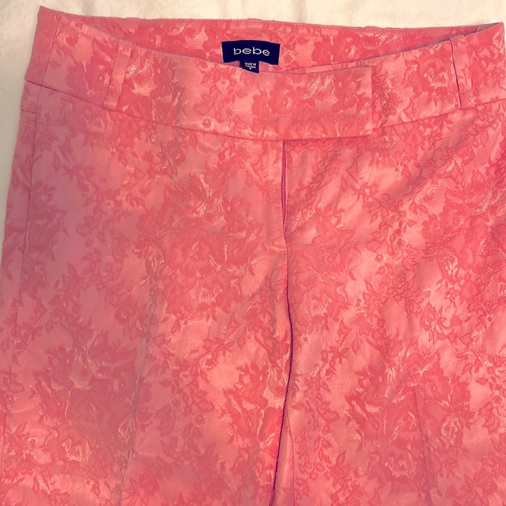 Bebe size 4 cropped dress pants. Beautiful pink with pattern.
